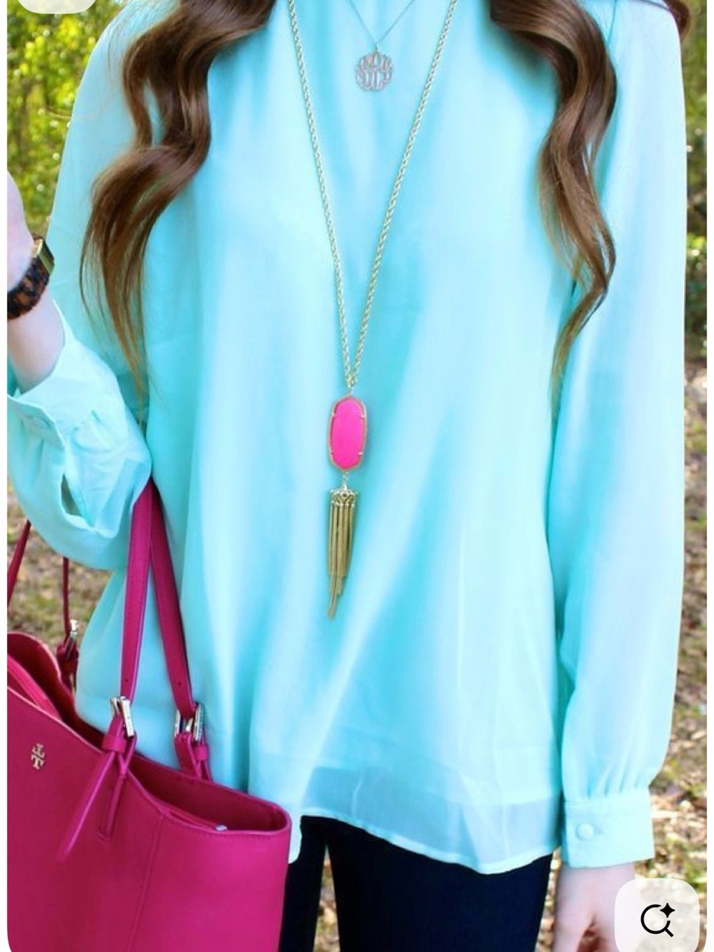 Gold chain and red diamond shaped necklace